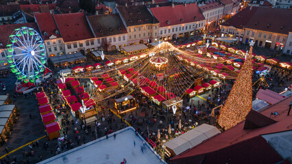 Aerial photography of the Christmas Fair in Sibiu shot from a drone at a higher altitude with...