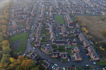 Fototapeta premium Aerial Houses Residential British England Drone Above View Summer Blue Sky Estate Agent Morning Sunrise House Prices 2022.