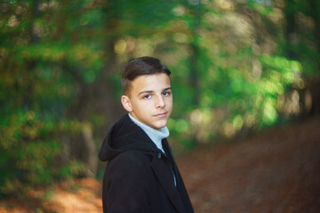 portrait of handsome young man outdoors