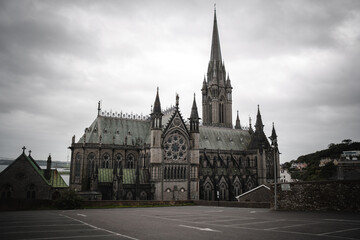 Fototapeta na wymiar The neo-gothic Cathedral of St. Colman, usually called in Cobh Cathedral, is a Roman Catholic cathedral in Cobh, Ireland.