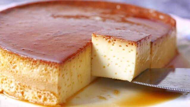  Caramel custard pudding on a plate on table 