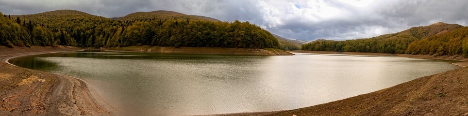 Irabia reservoir in the Irati Forest, a paradise in autumn. Navarra Pyrenees, Spain