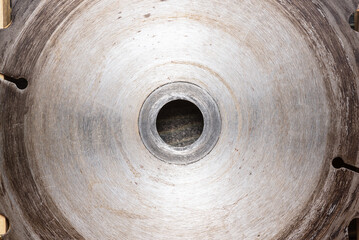 Circular saw blade top view background.