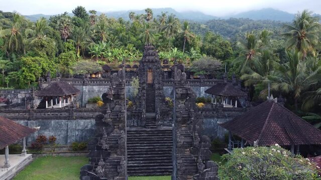 Aerial Beautiful Temple in Bali Surrounded by Forest and Mountain - Pura Puseh Les - Penuktukan Buleleng