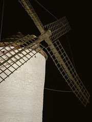 Windmills in Castilla La Mancha, Spain, at night. Copy space.
