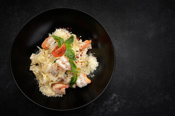 Pasta with shrimp, cheese, mushrooms and vegetables