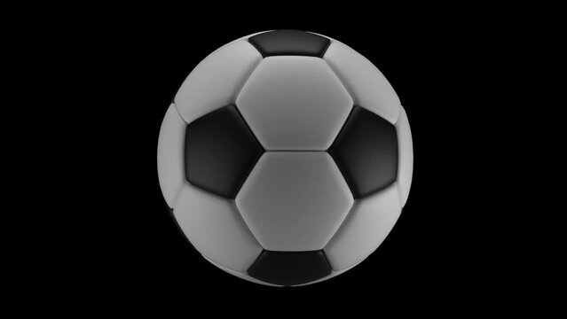 Spinning soccer or football ball with white and black plastic material on transparent background with alpha channel