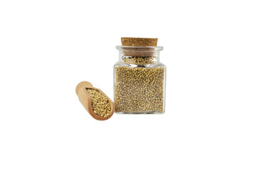 quinoa in wooden scoop and glass jar on isolated on white background. nutrition. food ingredient.