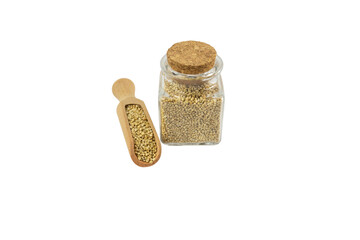 quinoa in wooden scoop and glass jar on isolated on white background. nutrition. food ingredient.