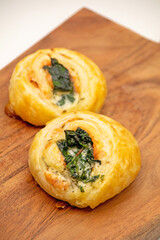 salmon rolls in leaf dough - 545763383
