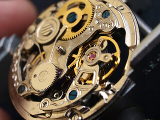 close up pic of vintage watch mechanism
