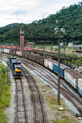 General view of old train station with clock tower and old trains in Paranapiacaba, Sao Paulo, Brazil