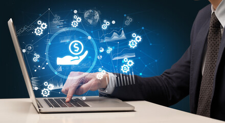 Business hand working on laptop, successful business concept