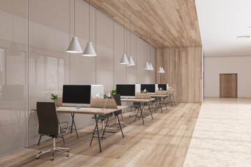 Fototapeta na wymiar Perspective view on light stylish open space office with row of work places with modern computers on wooden floor, near beige glossy wall under white lamps from top. 3D rendering