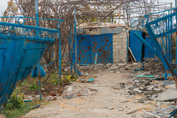 Countryside. House destroyed by shelling. War in Ukraine. Russian invasion of Ukraine. Destruction...