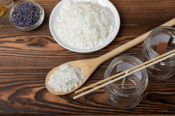 Ecological and vegan handmade soy wax candles with wooden wick. Transparent container, essential oil, soy wax, matches and dried flowers. MOCKUP, space for text. Handmade craft candles.