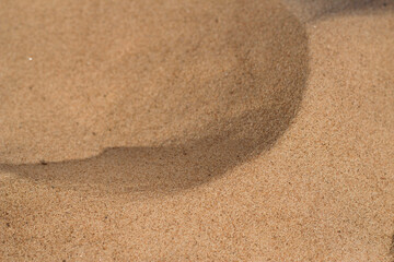 Fototapeta na wymiar texture of sand in summer beach