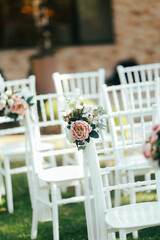 wedding day decoration - flowers on seats
