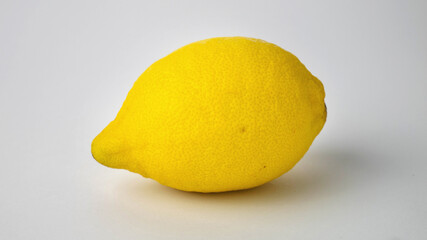 yellow lemon closeup on white background