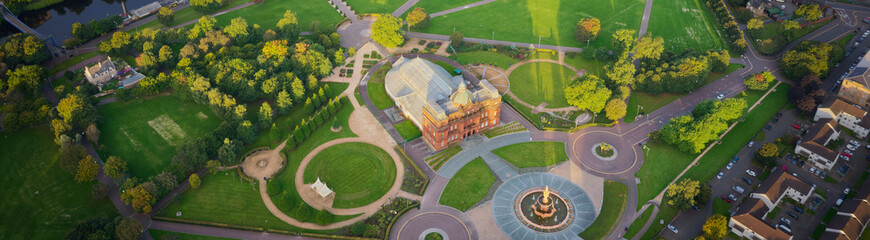 Aerial view of Peoples Palace at sunrise above park