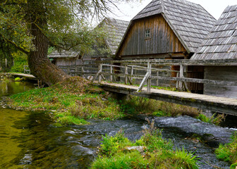 Old wooden houses at the source of clean drinking water