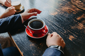 Couple drinking coffee at cafe restaurant man and woman