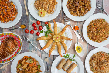 Dishes with great Chinese food recipes, noodles with beef and oyster sauce, Vietnamese rolls, noodles with vegetables, Pekin duck, shrimp tempura and fried gyozas