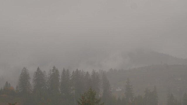 autumn carpathians, slavske, western ukraine, timelapse in the mountains, clouds and fog fly by quickly.