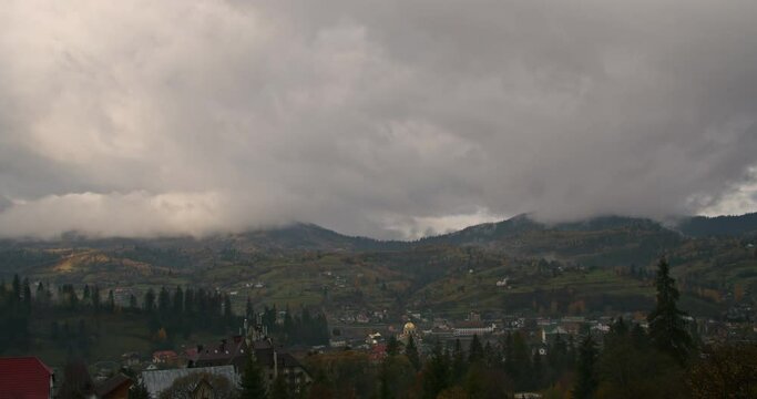 autumn carpathians, slavske, western ukraine, timelapse in the mountains, clouds and fog fly by quickly.