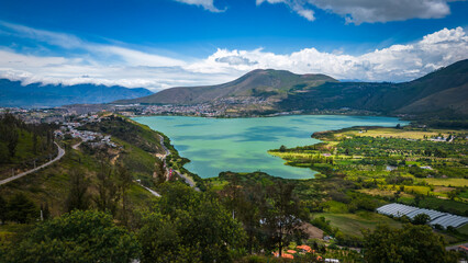 Fototapeta na wymiar Lake formed from glacial meltwater near mountains, aerial, Yawarkucha, Ecuador