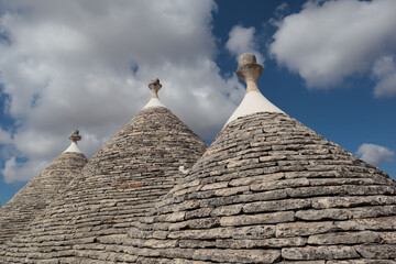 Fototapeta na wymiar Trulli roofs in Alberobello. Alberobello, Puglia, Italy