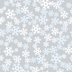 Snow seamless pattern. Christmas texture. Winter holiday flowing snowflakes background.