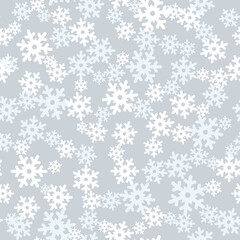 Snow seamless pattern. Christmas texture. Winter holiday flowing snowflakes background.