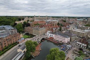 Naklejka premium Cambridge City centre punts on river cam UK drone aerial view .