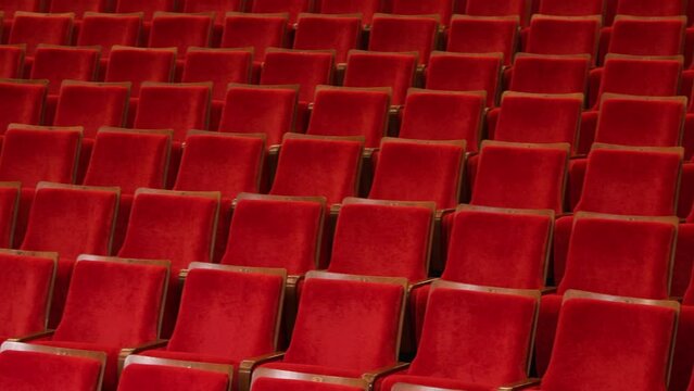 panorama over the seats of the auditorium in the concert and theater hall. red upholstery of soft chairs 