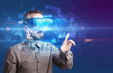 Businessman looking through VR glasses