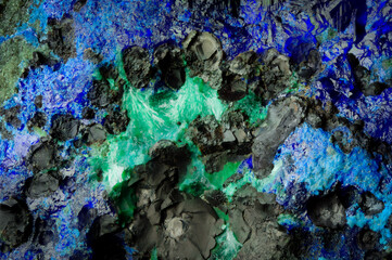 Malachite and azurite macro detail texture background. close-up raw rough unpolished semi-precious...