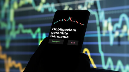 Un inversor está analizando el obbligazioni garantite germania etf fondo en pantalla. Un teléfono...