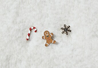 christmas gingerbread cookies and snow. Christmas and New Year decorations on a fluffy white background