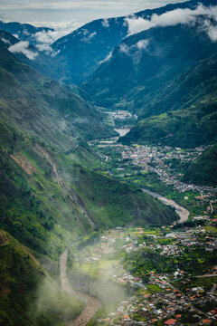 vertical of banos de agua santa ecuador travel holiday destination famous for lush green valley trekking and waterfall 