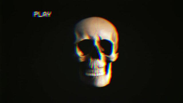 A VHS tape recording, with intentional datamosh distortion, showing an ominous skull in the darkness. Halloween horror clip.
