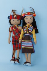 Male and female dolls in traditional indigenous Filipino costume