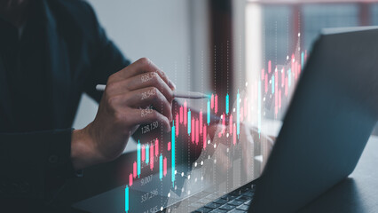 data analysis concept, a businessman working with computer laptop graph to analyst data chart. 