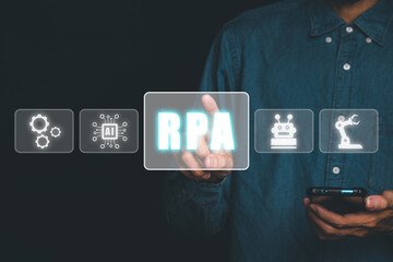 RPA Robotic Process Automation Innovation technology concept, Person using smart phone and hand holding VR screen RPA icon on black background.