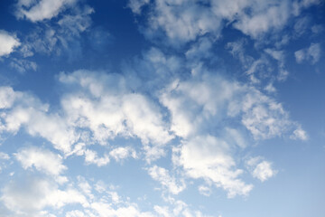 Picturesque view of beautiful fluffy clouds in light blue sky