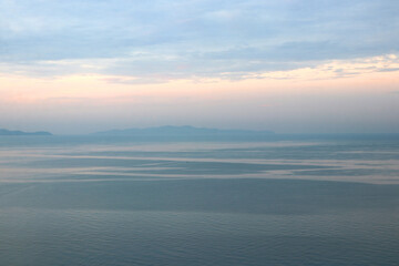 Fototapeta premium peaceful ocean with beautiful sunrise background