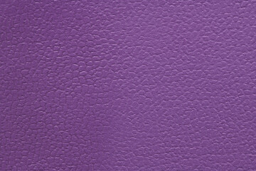 Closeup detail of purple leather texture background.