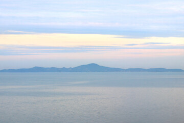 Fototapeta na wymiar peaceful ocean with beautiful sunrise background