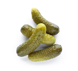 Pile of tasty pickled cucumbers on white background, top view