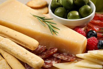 Snack set with delicious Parmesan cheese, closeup